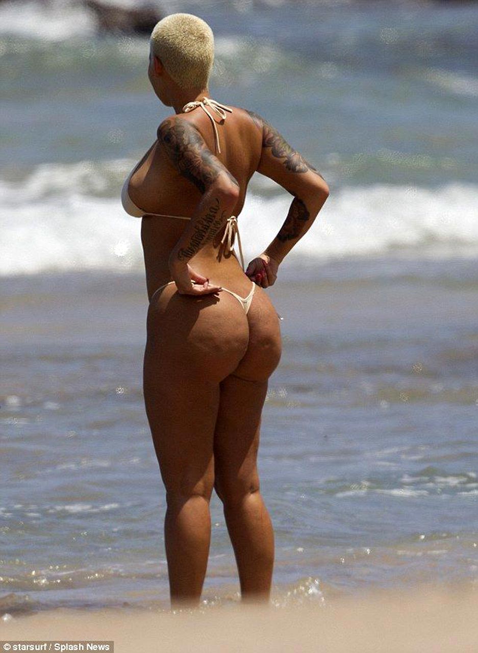 Amber Rose Topless on Beach.