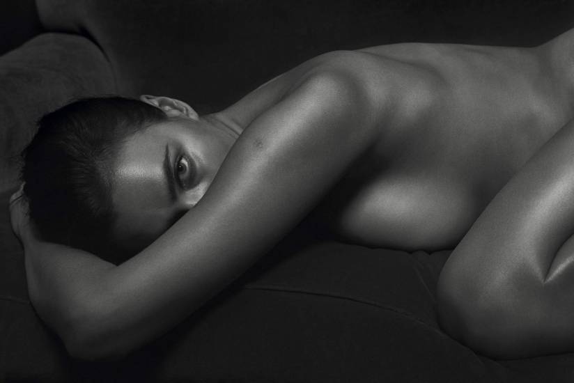 Irina Shayk naked sideboob pressed down the bed