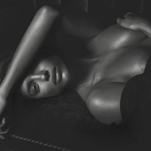 Irina Shayk nipple slip while lying