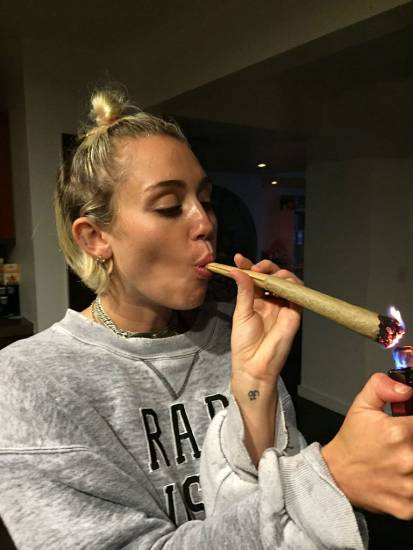 Miley Cyrus smoking