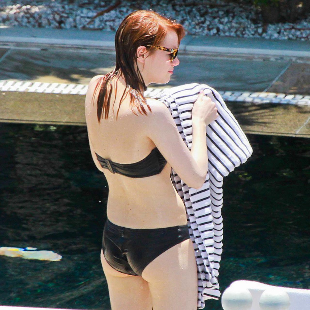 bathing beauty emma stone shows off her fine form in a bikini on, celebrity...