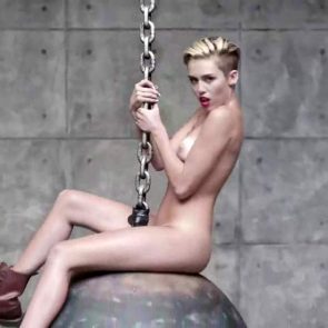 Miley Cyrus naked on the ball