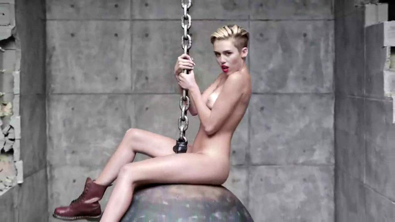 Blowjobs Miley Cyrus - Miley Cyrus Topless Behind The Scenes of 'Wrecking Ball ...