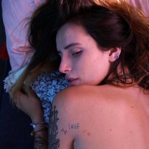 Bella Thorne nude in bed from back