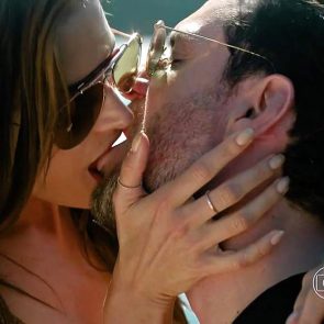 Alessandra Ambrosio kissing a man