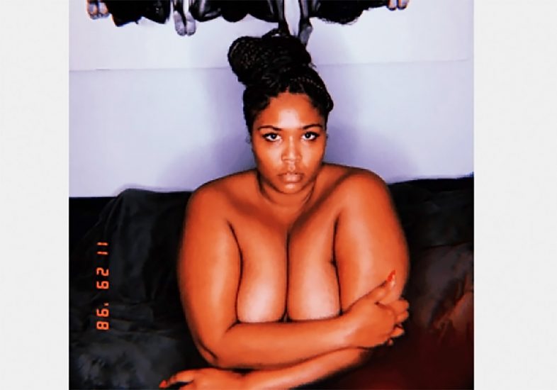 Lizzo covering the boobs