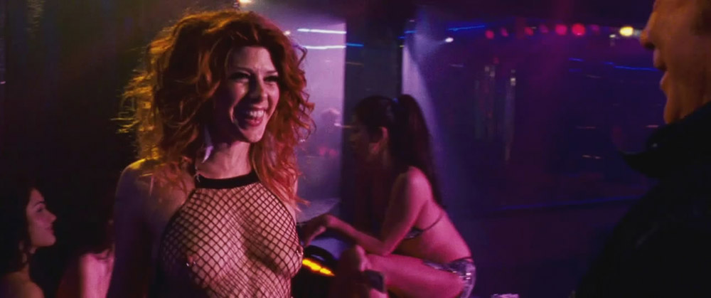 Marisa Tomei is wearing nothing but a thong as she gives a guy a lapdance i...