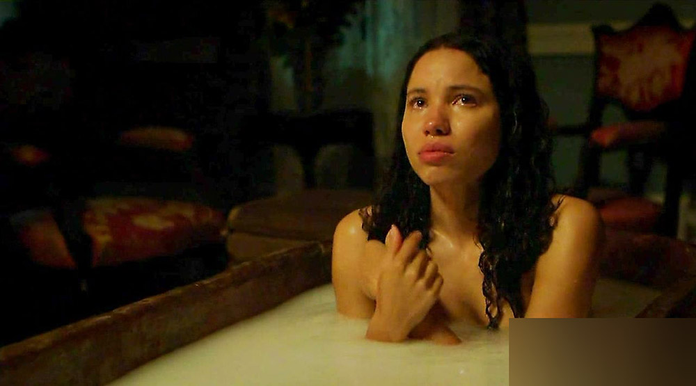 In the second scene, Jurnee Smollett-Bell nude belly is seen covered with l...