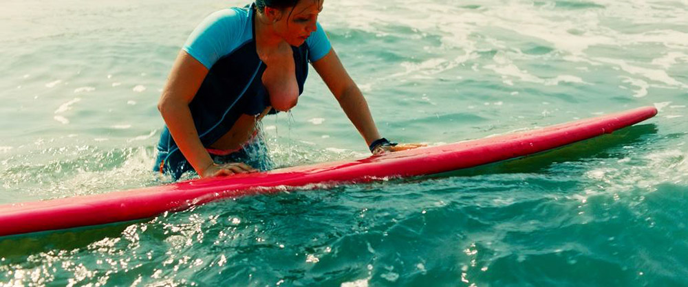 Big boobs babes strip naked and try out surf boarding