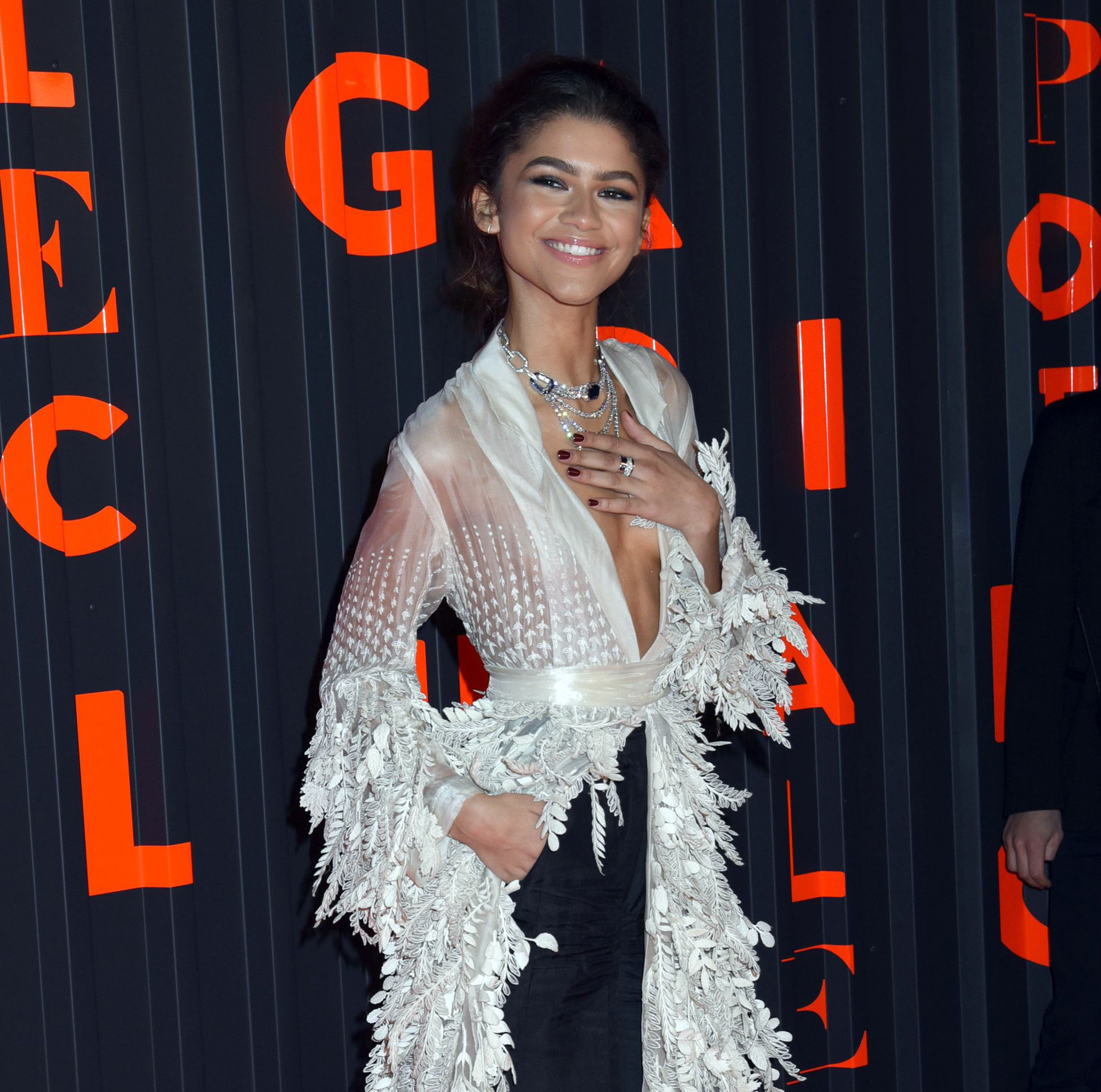 Here folks are a few shots of Zendaya tits as she went braless on the red c...