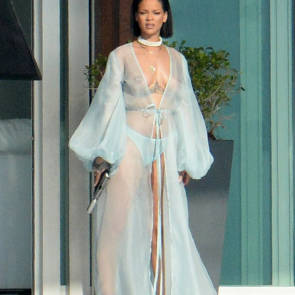 rihanna in topless looking at paparazzi