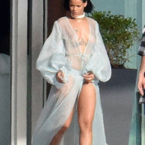 rihanna topless in front of house