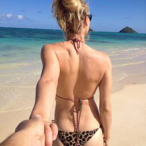 Yvonne Strahovski At Beach holding boyfriend's hand