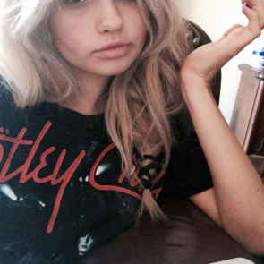 Debby Ryan in black shirt