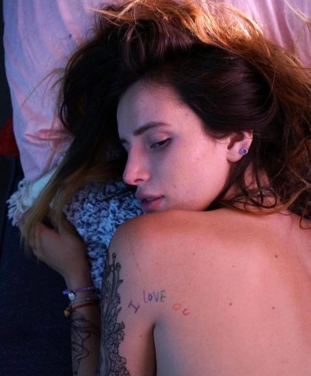 Bella Thorne nude in bed from back