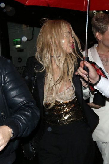 Rita Ora nipples out of bra