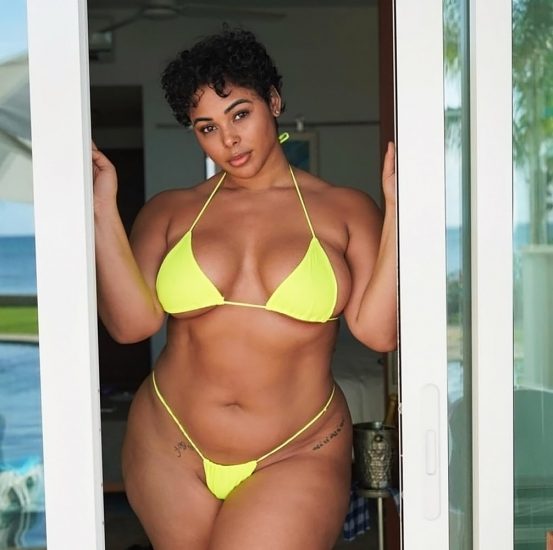 Tabria Majors yellow bikini